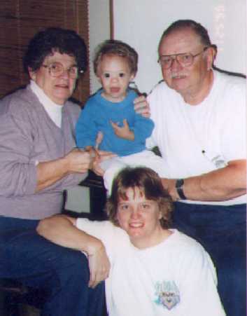 [ Kay, youngest grandson, Paul and daughter Christine Sanderson ]