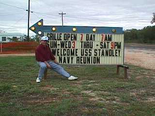 Chris Raker rearranging Lake Point Resort Marquee; Lake Buchanan, TX